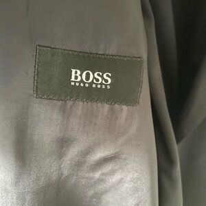 Men’s Navy Hugo Boss Suit and pants.